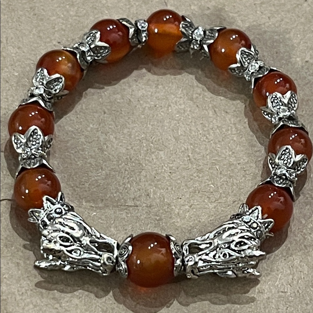 CARNELIAN BEADED BRACELET WITH SILVERTONE DRAGON HEADS